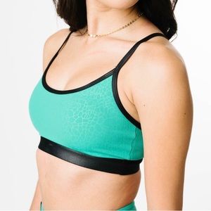 Zyia matching bra in black with teal leopard coloring, size medium